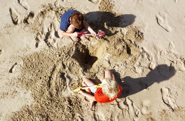 Image of a family on the beach