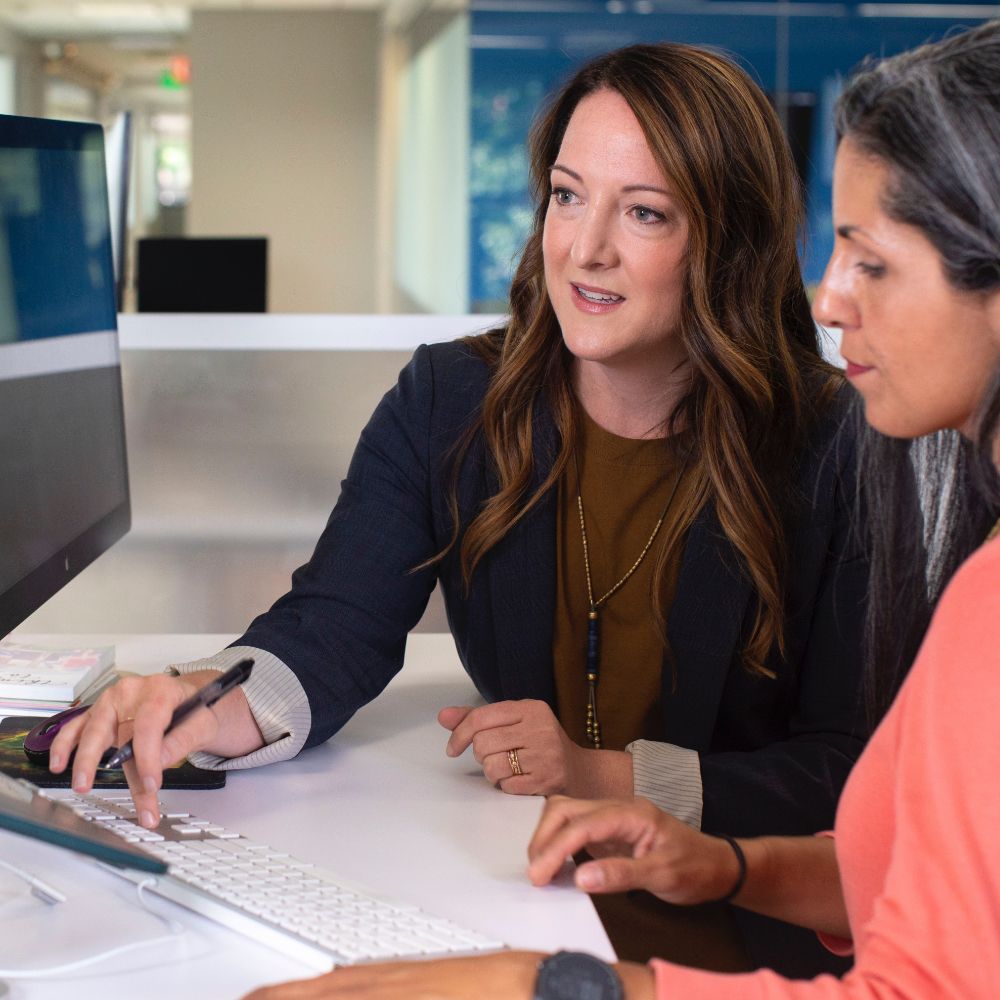Image of office workers using the web