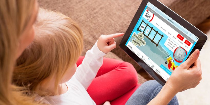 Image of girl playing games on an iPad